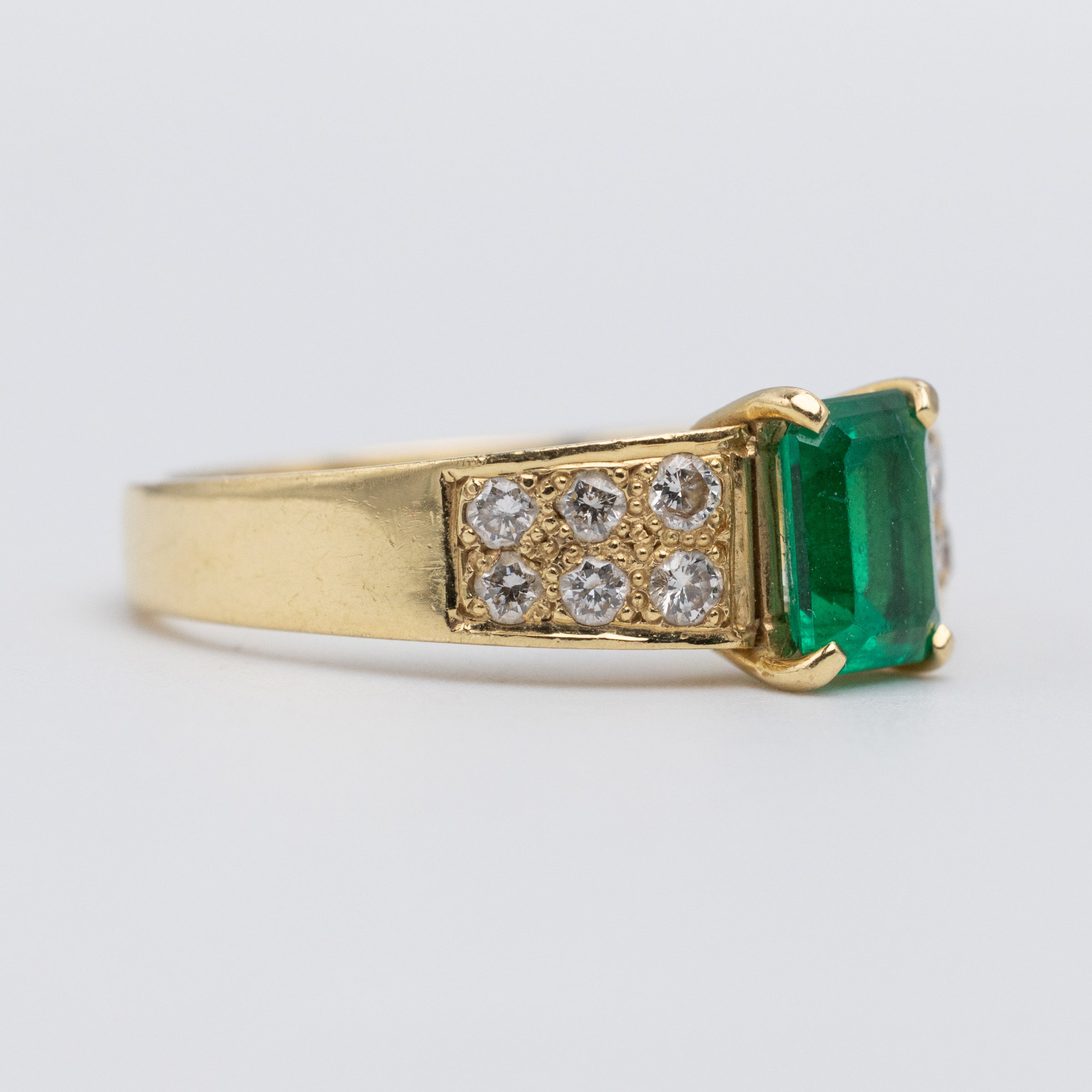 emerald and diamond ring left