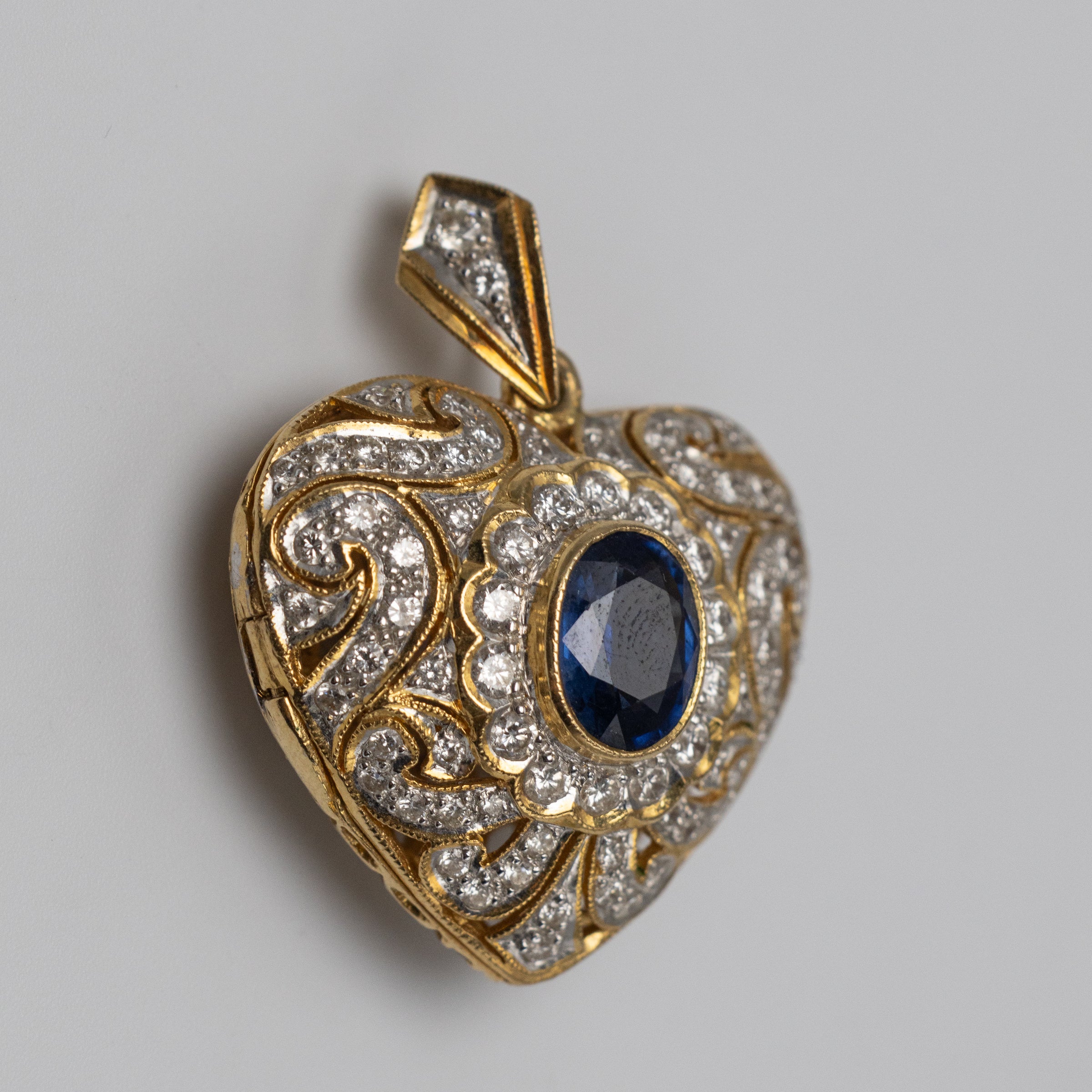 Sapphire And Diamond Locket left side