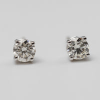 white gold diamond studs front