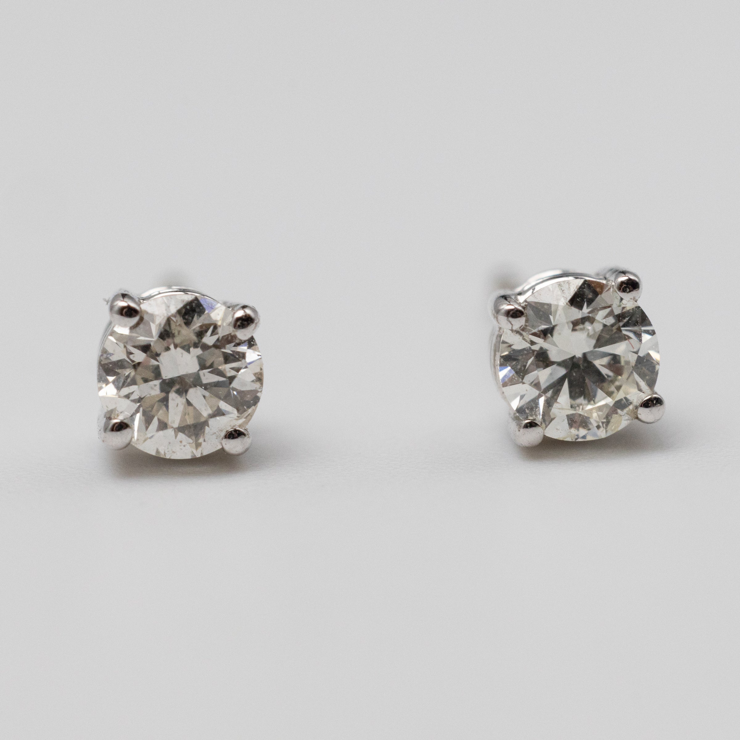 white gold diamond studs front