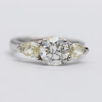 Beautiful Platinum Diamond Trilogy Ring With Natural Yellow Side Stones
