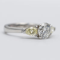 Beautiful Platinum Diamond Trilogy Ring With Natural Yellow Side Stones