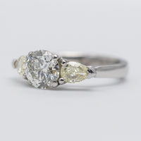 Beautiful Platinum Diamond Trilogy Ring With Natural Yellow Side Stones