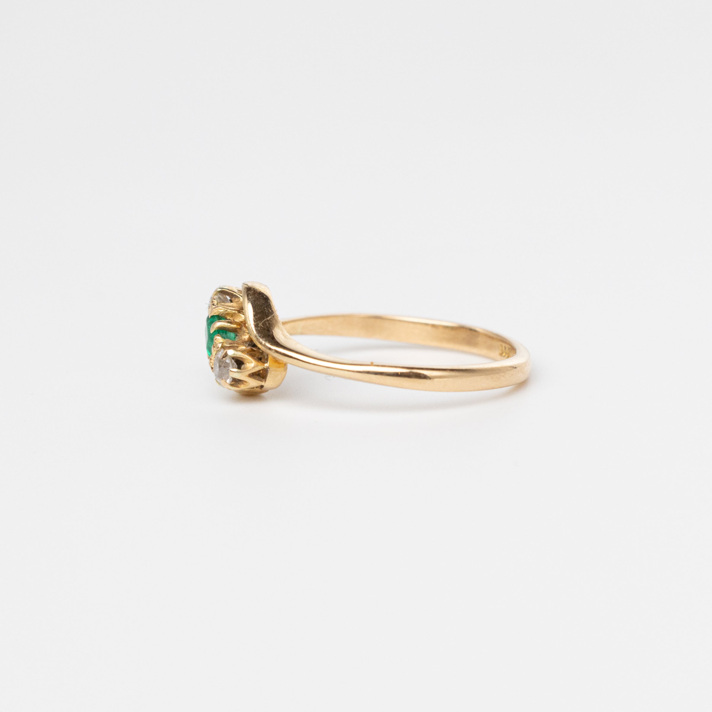 Trilogy Emerald And Diamond Twist Ring