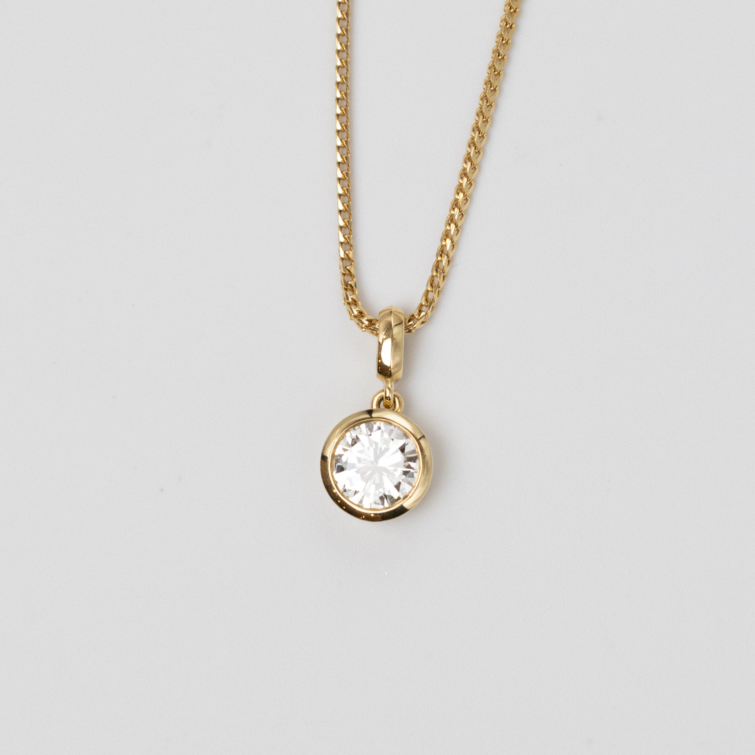 GIA 0.97 Carat Diamond Bezel Set Pendant