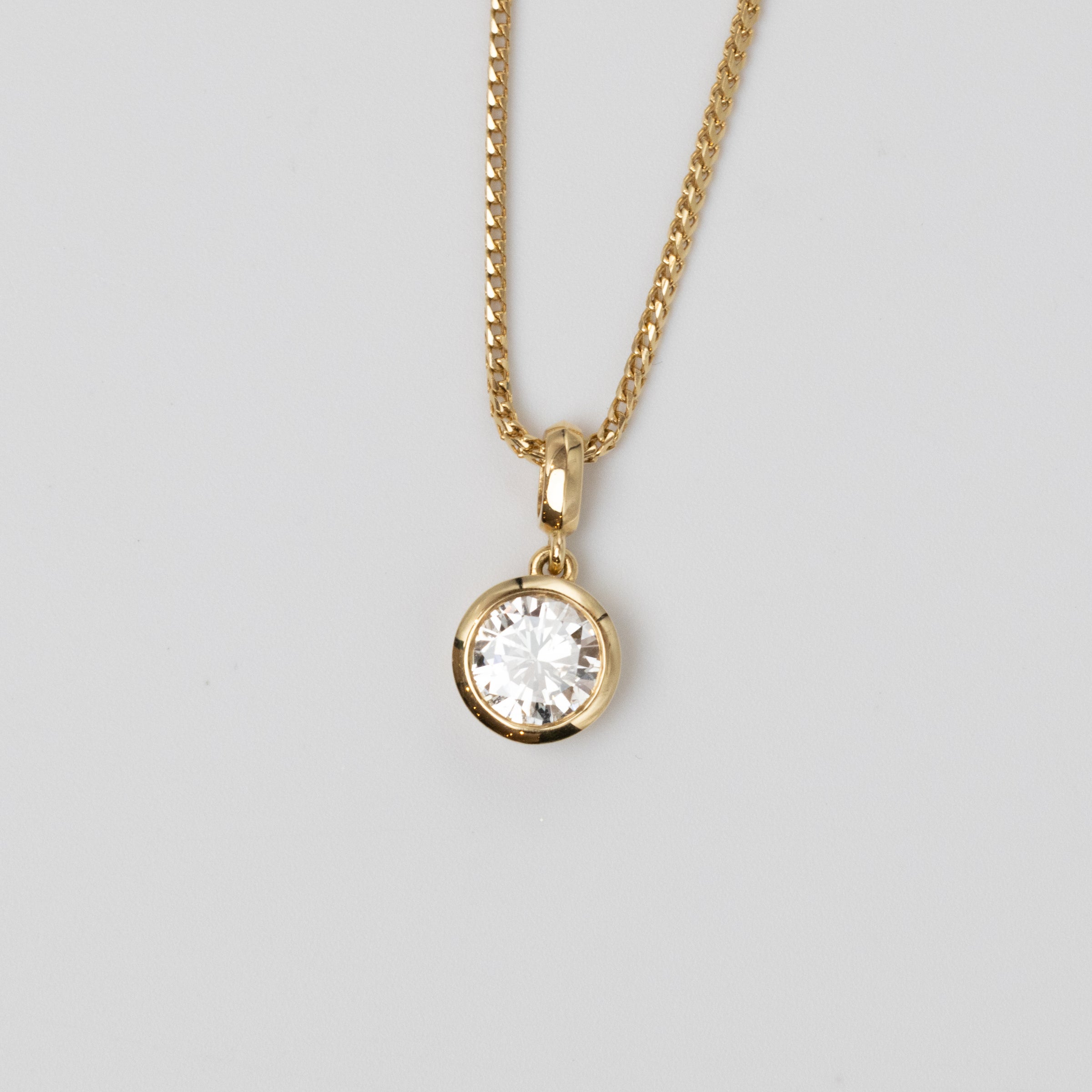 GIA 0.97 Carat Diamond Bezel Set Pendant