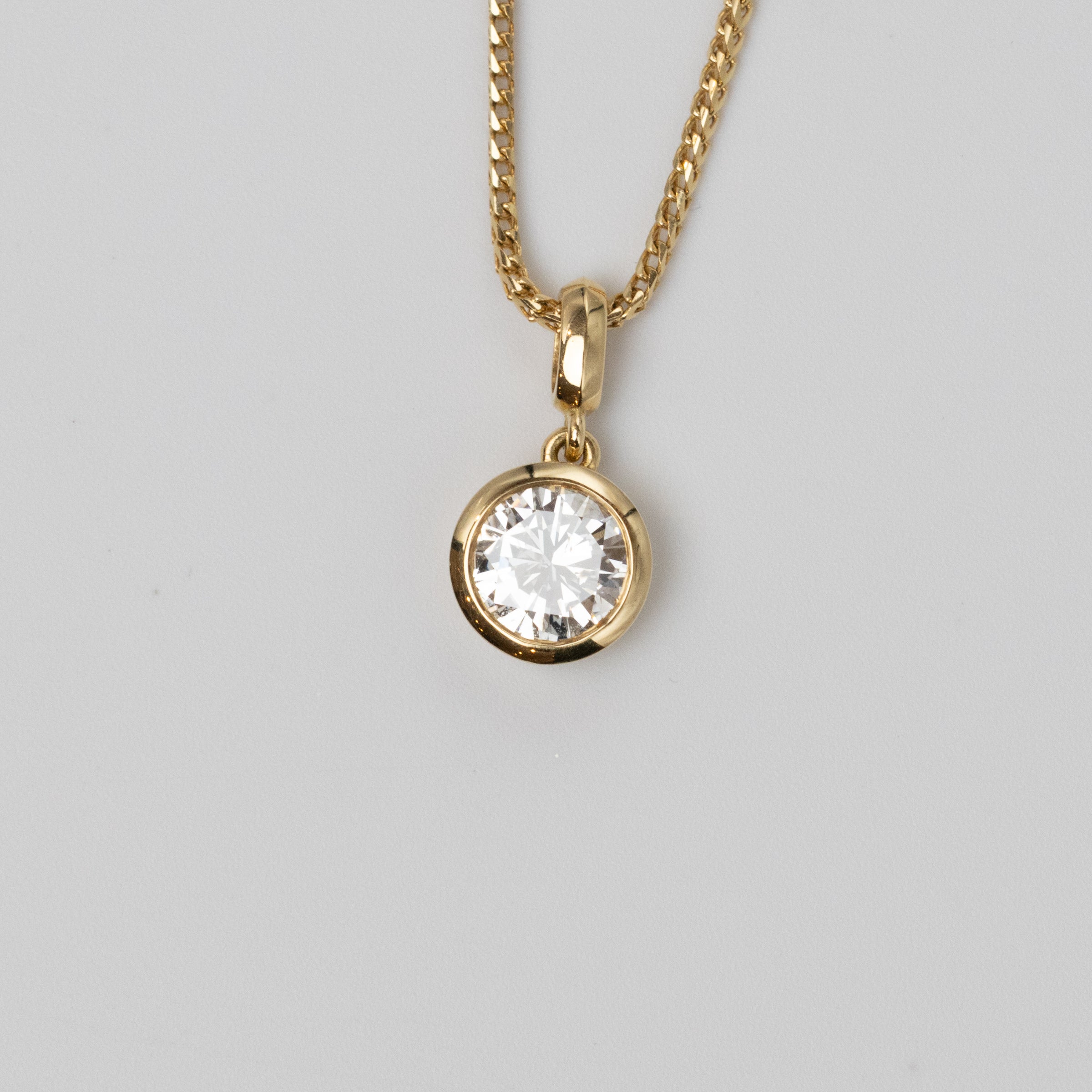 GIA 0.97 Carat Diamond Bezel Set Pendant