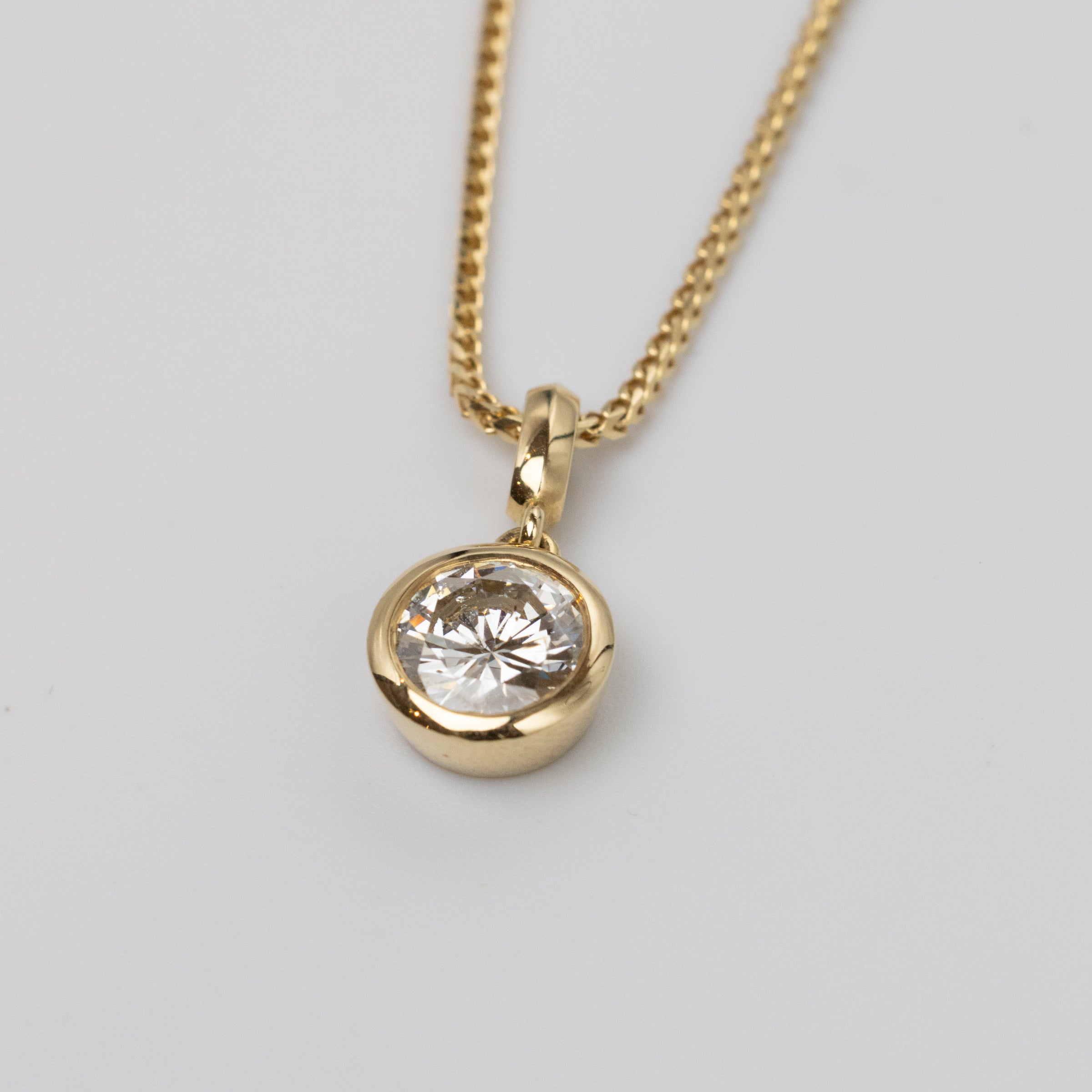 GIA 0.97 Carat Diamond Bezel Set Pendant