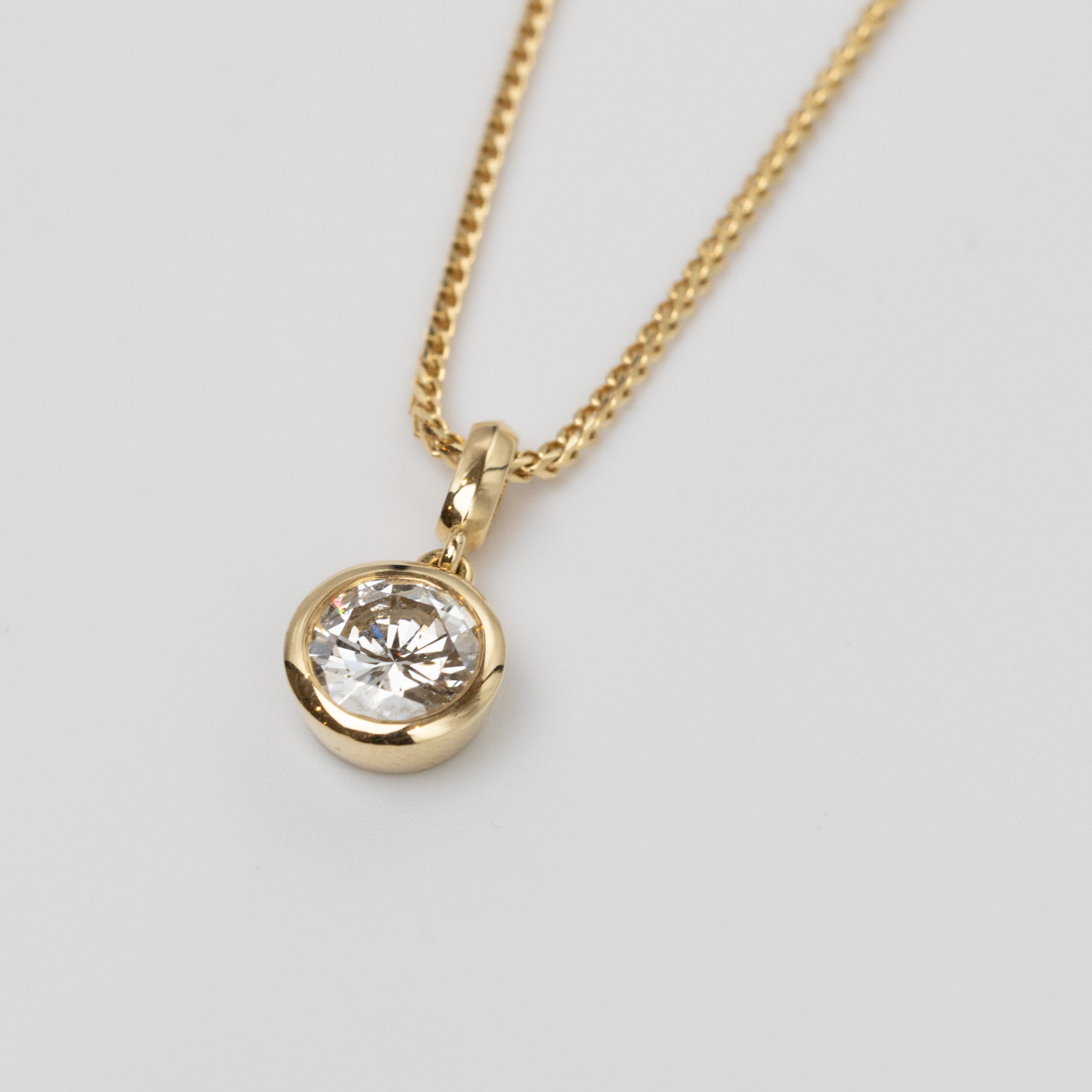 GIA 0.97 Carat Diamond Bezel Set Pendant