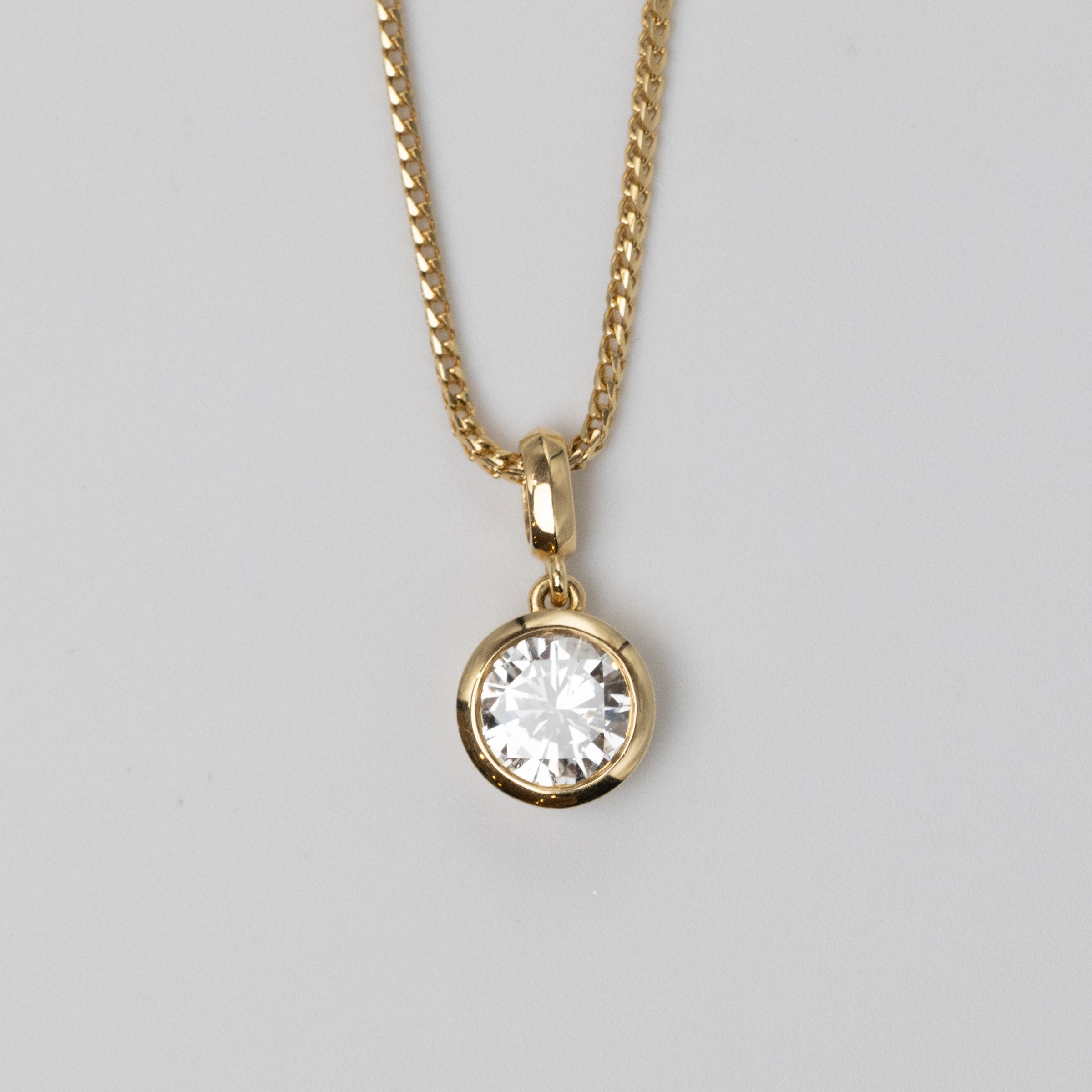 GIA 0.97 Carat Diamond Bezel Set Pendant