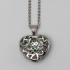18K Gold Diamond And Emerald Heart Pendant
