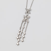 An Elegant 18K White Gold Diamond Pendant
