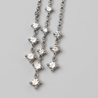 An Elegant 18K White Gold Diamond Pendant