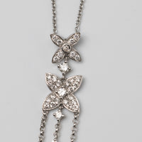 An Elegant 18K White Gold Diamond Pendant