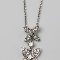 An Elegant 18K White Gold Diamond Pendant