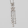 An Elegant 18K White Gold Diamond Pendant