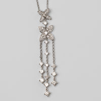 An Elegant 18K White Gold Diamond Pendant
