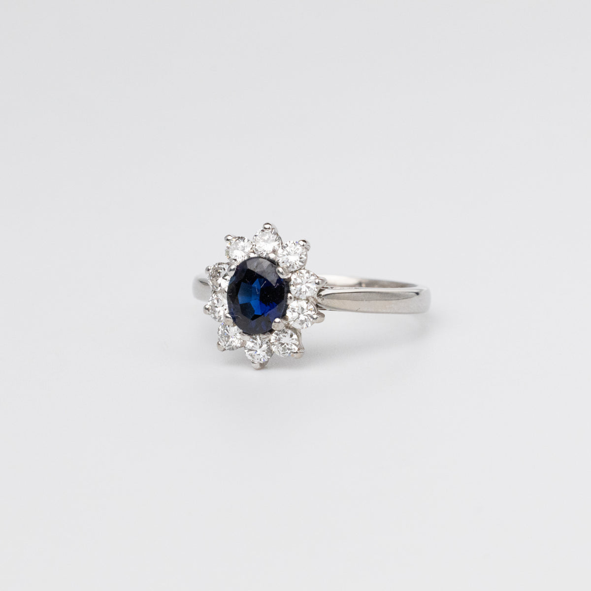 Oval Sapphire And Diamond Cluster Ring