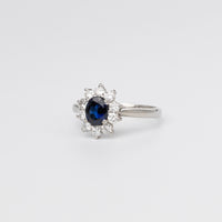 Oval Sapphire And Diamond Cluster Ring