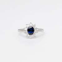 Oval Sapphire And Diamond Cluster Ring