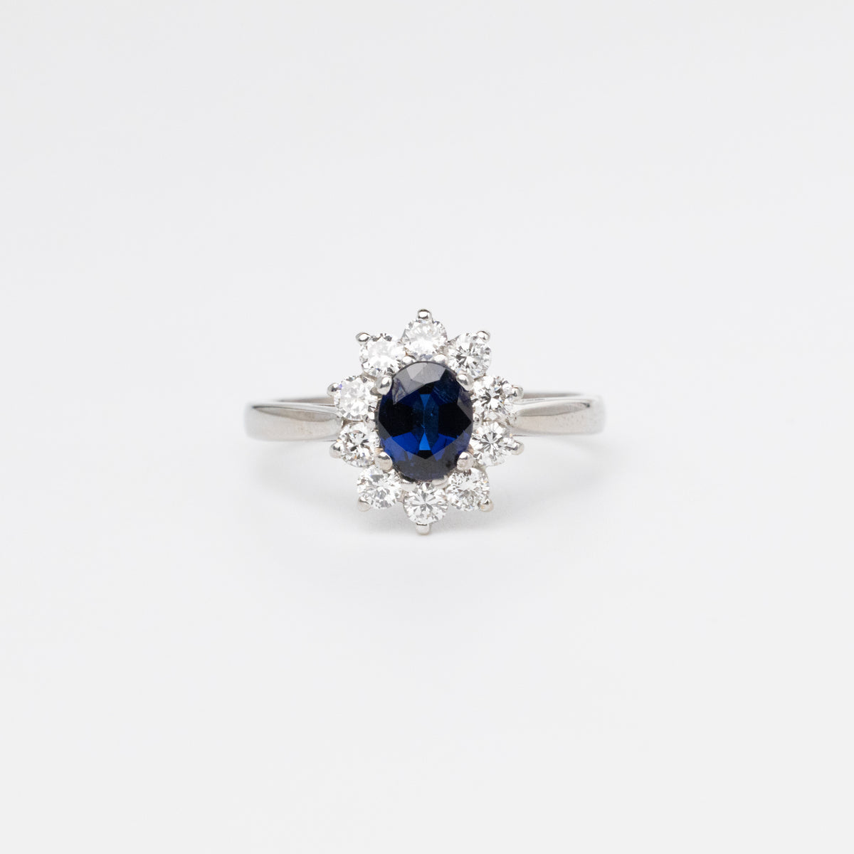 Oval Sapphire And Diamond Cluster Ring