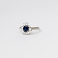 Oval Sapphire And Diamond Cluster Ring