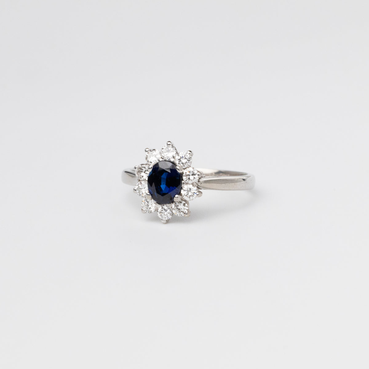Oval Sapphire And Diamond Cluster Ring